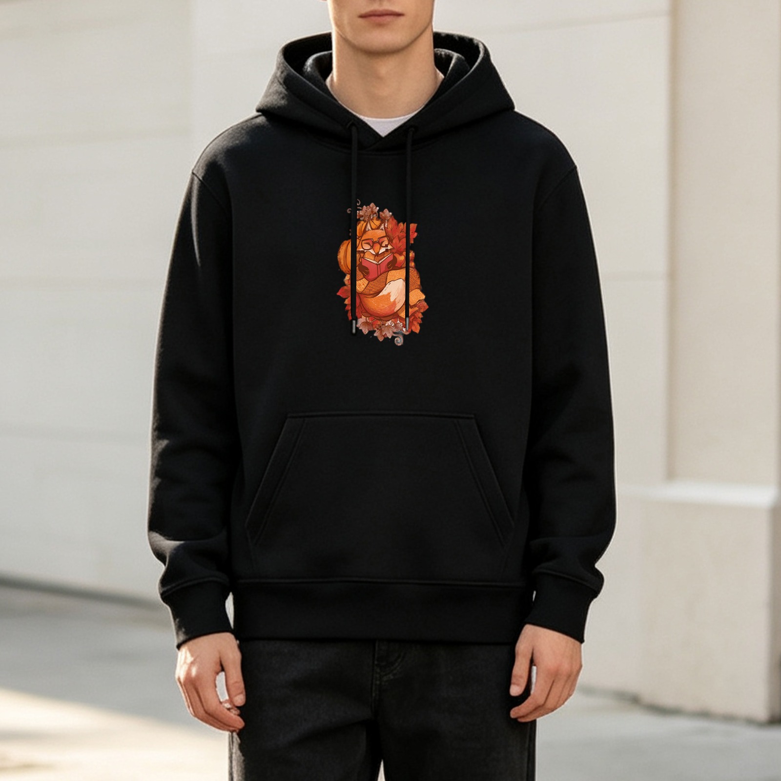 Black hoodie with autumn fox reading book graphic