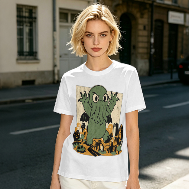 Olive T-shirt with cartoon Cthulhu monster destroying cityscape print