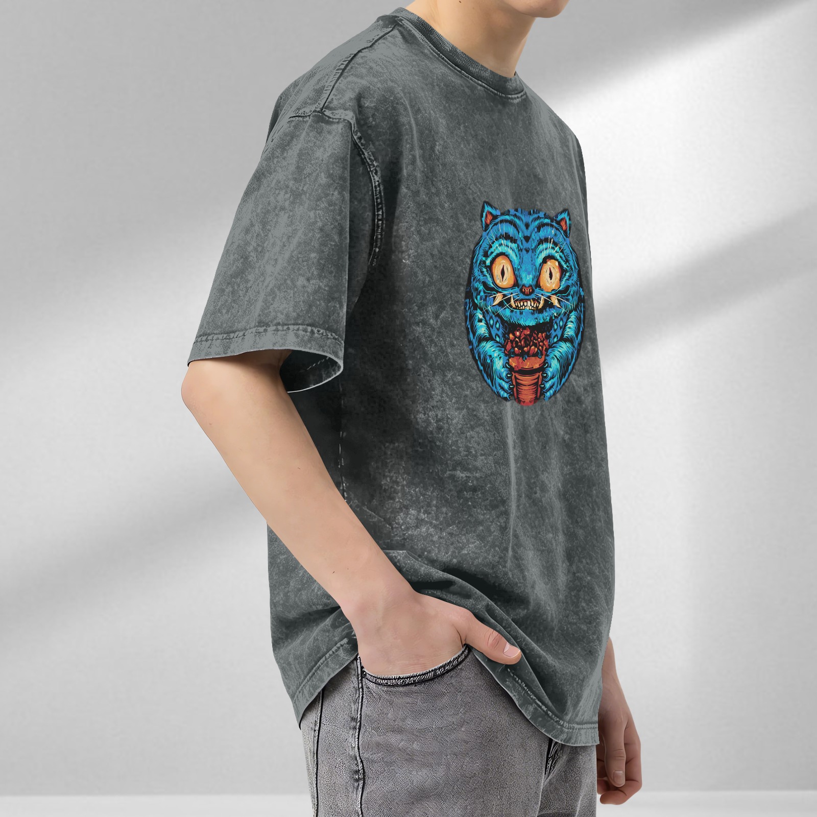 Washed Black Oversized T-Shirt With Blue Cheshire Cat Graphic