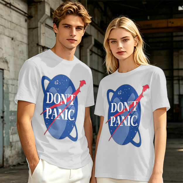 Olive green space-themed t-shirt with 'Don't Panic' print