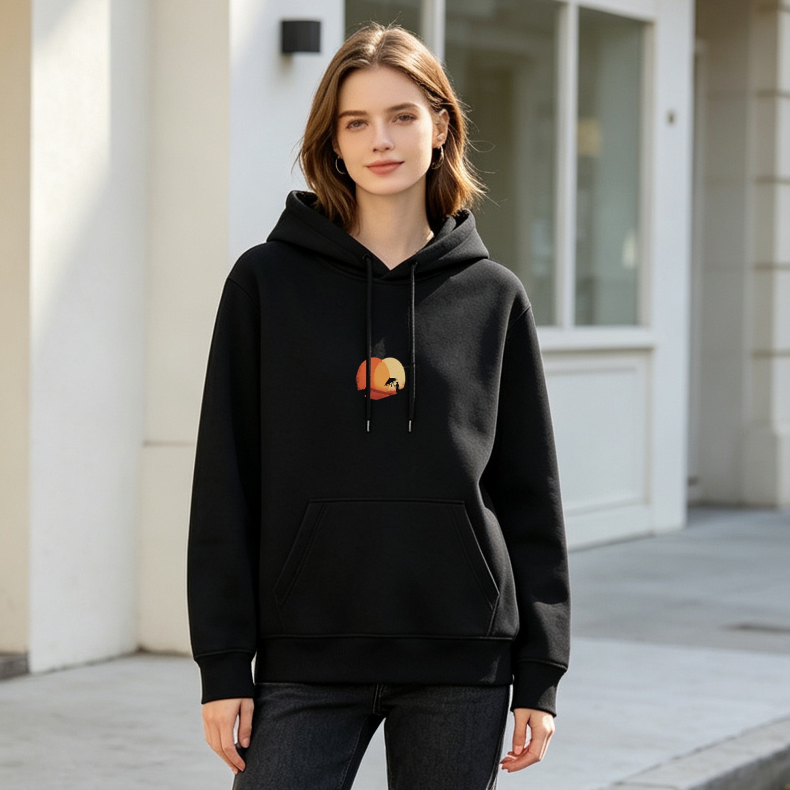 Black hoodie with desert sunset landscape graphic print