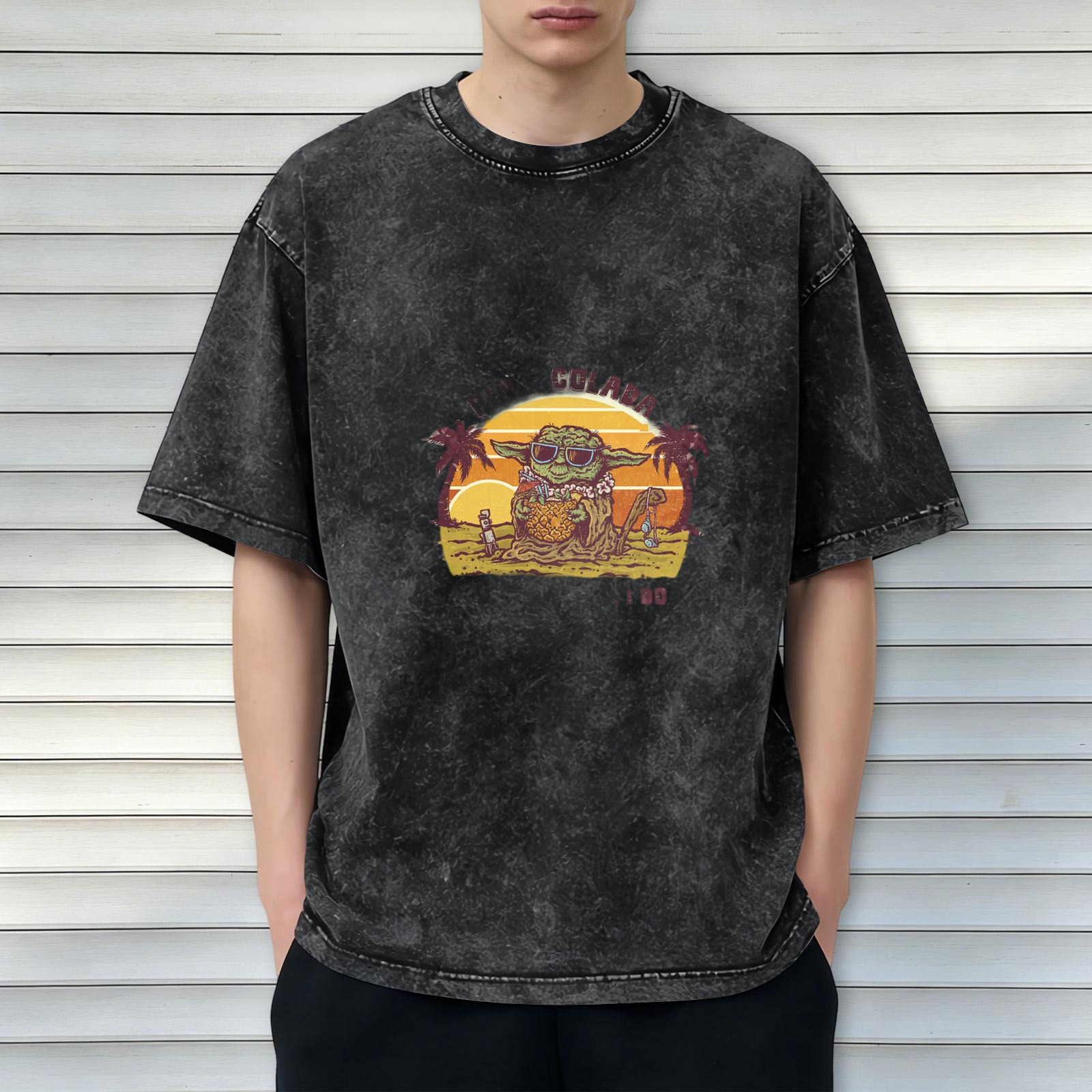 Washed black t-shirt with tropical Yoda sunset graphic