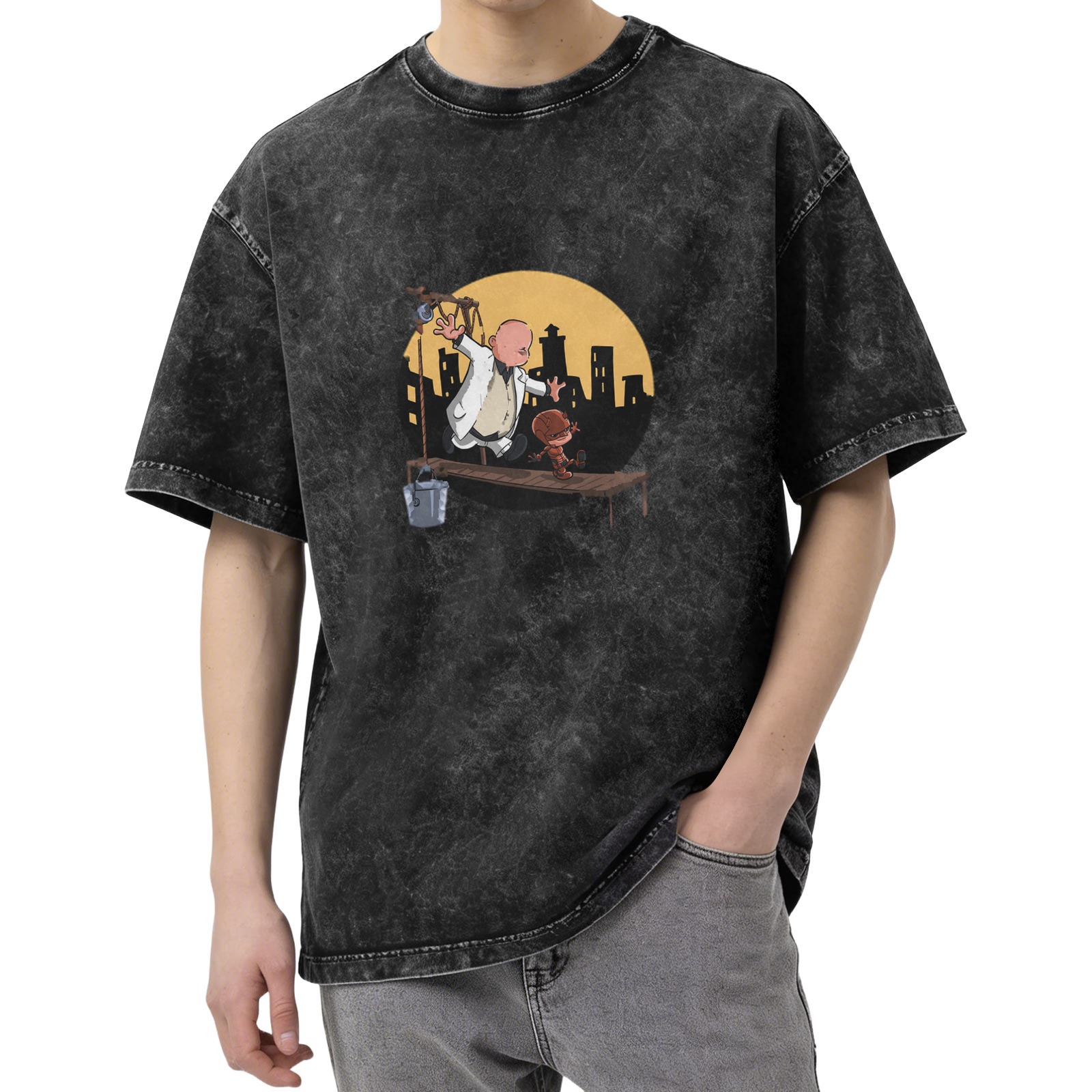 Washed black graphic t-shirt with cartoon characters on a scaffold city skyline