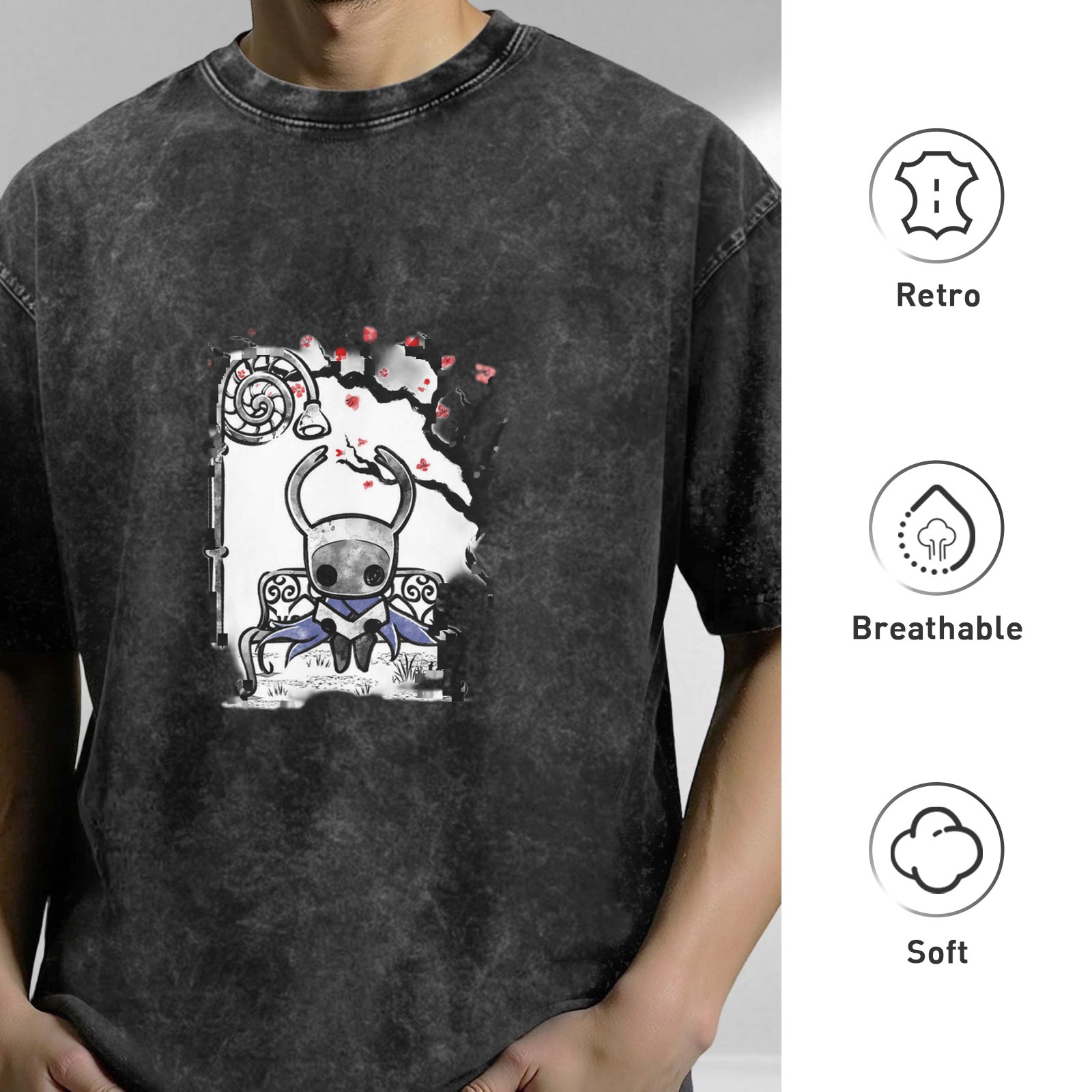 Washed black graphic t-shirt with Hollow Knight character on bench