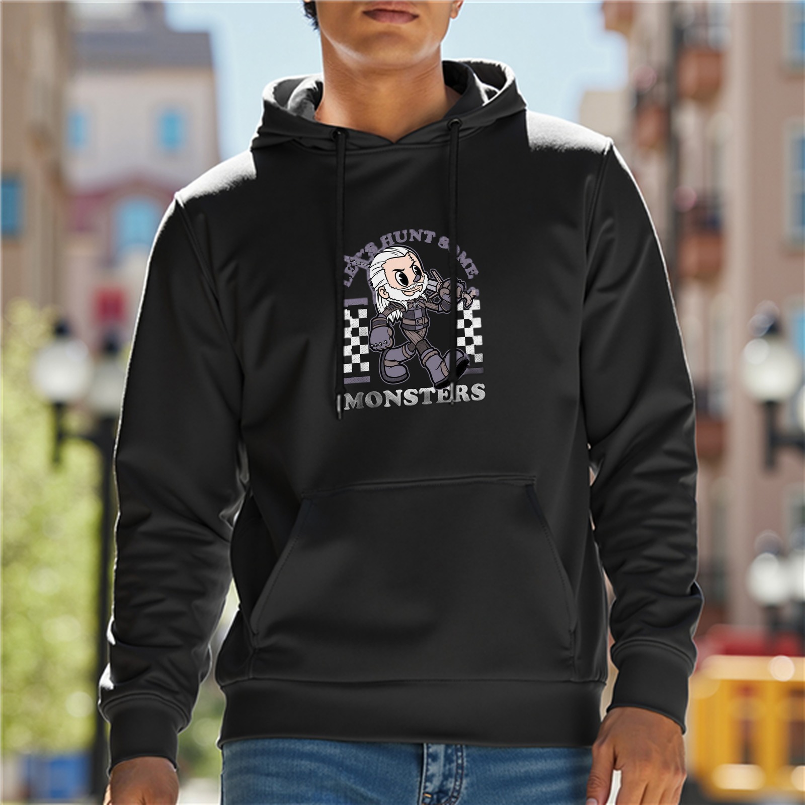 Black hoodie with cartoon witcher monster hunter graphic