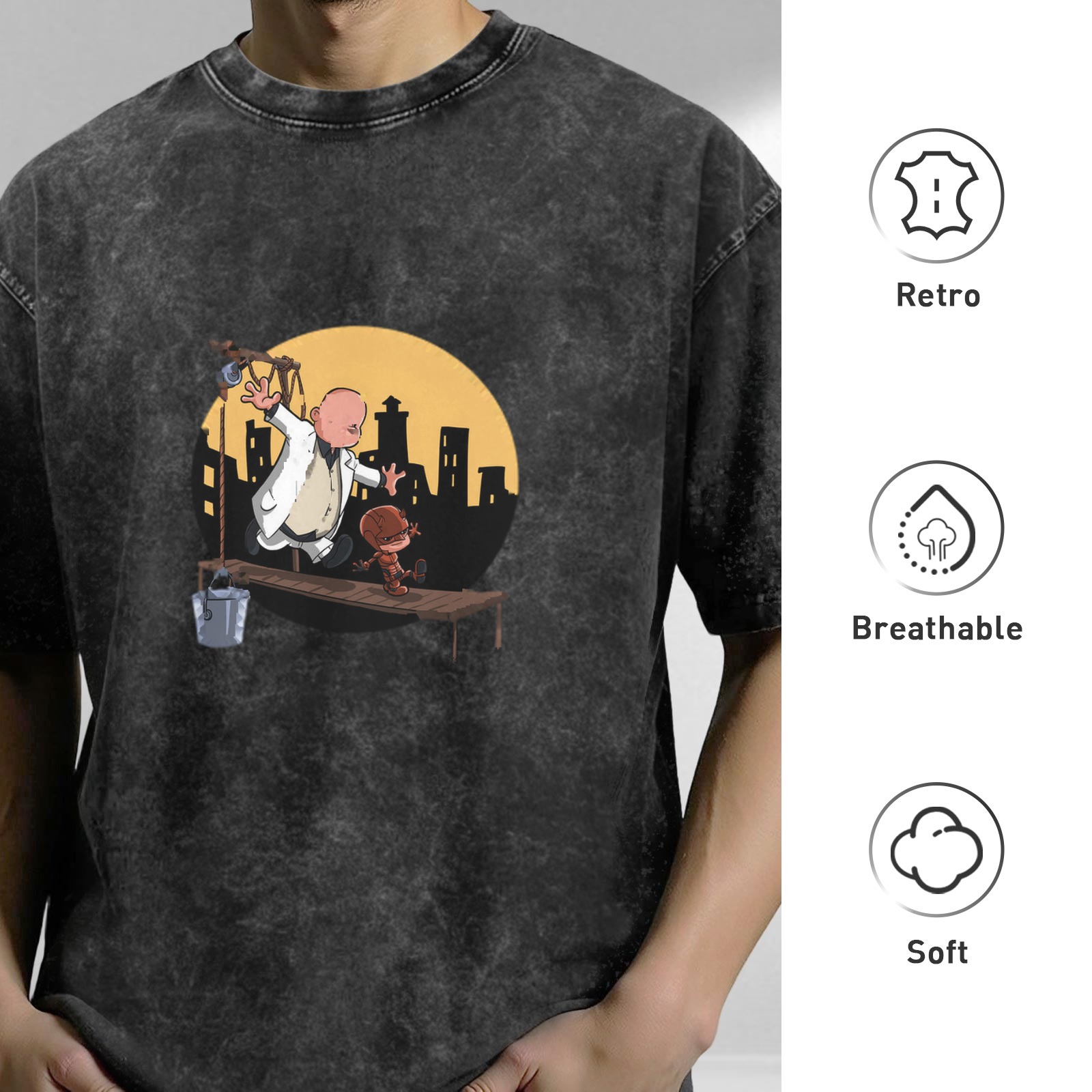 Washed black graphic t-shirt with cartoon characters on a scaffold city skyline