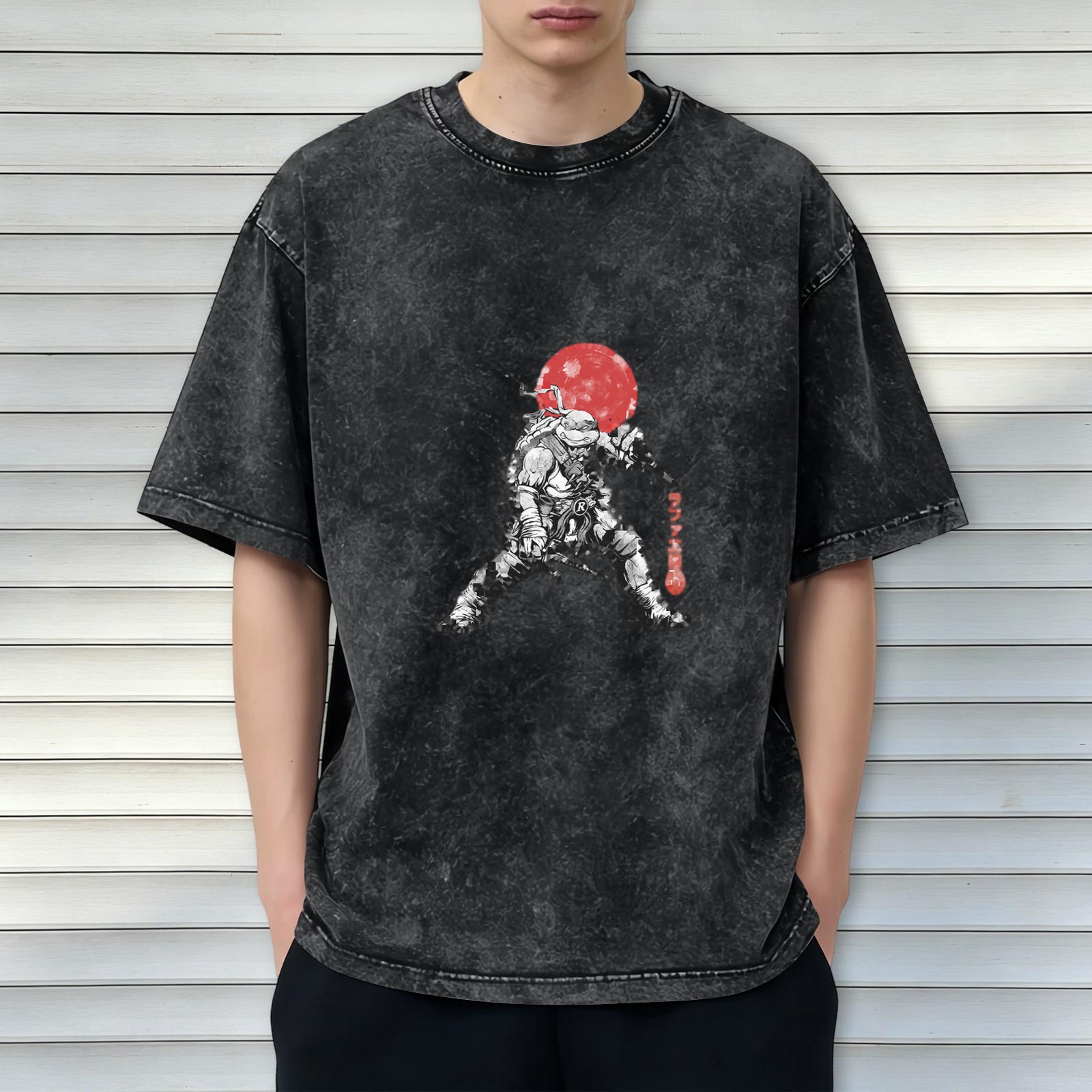 Washed black t-shirt with ninja turtle warrior graphic and red moon design