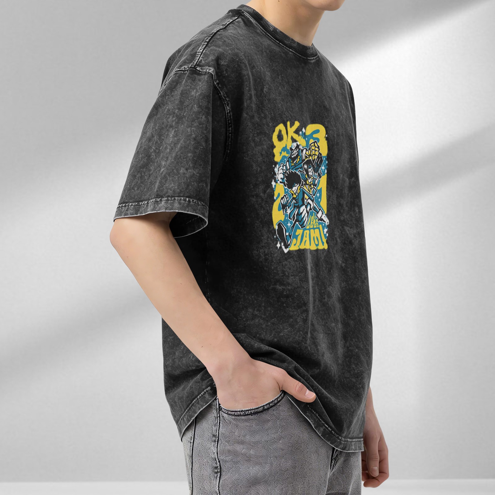Distressed washed black loose short-sleeved T-shirt with cartoon animation style pattern and the words 