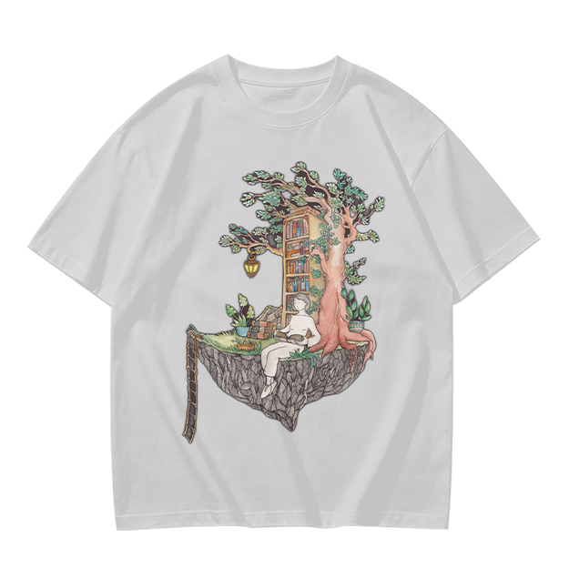 Olive t-shirt with whimsical floating treehouse reading scene print