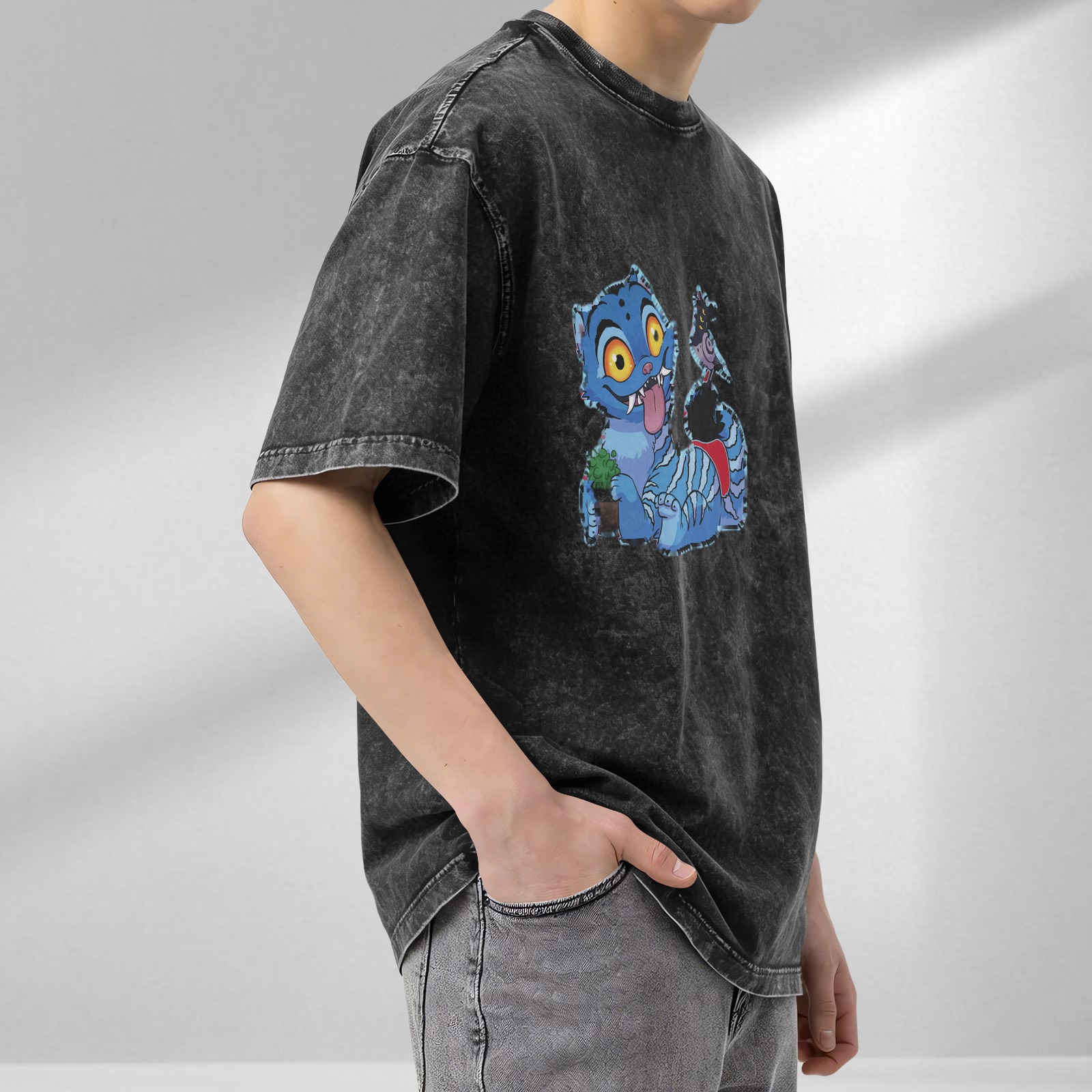 Washed black graphic t-shirt with playful blue fantasy cat print