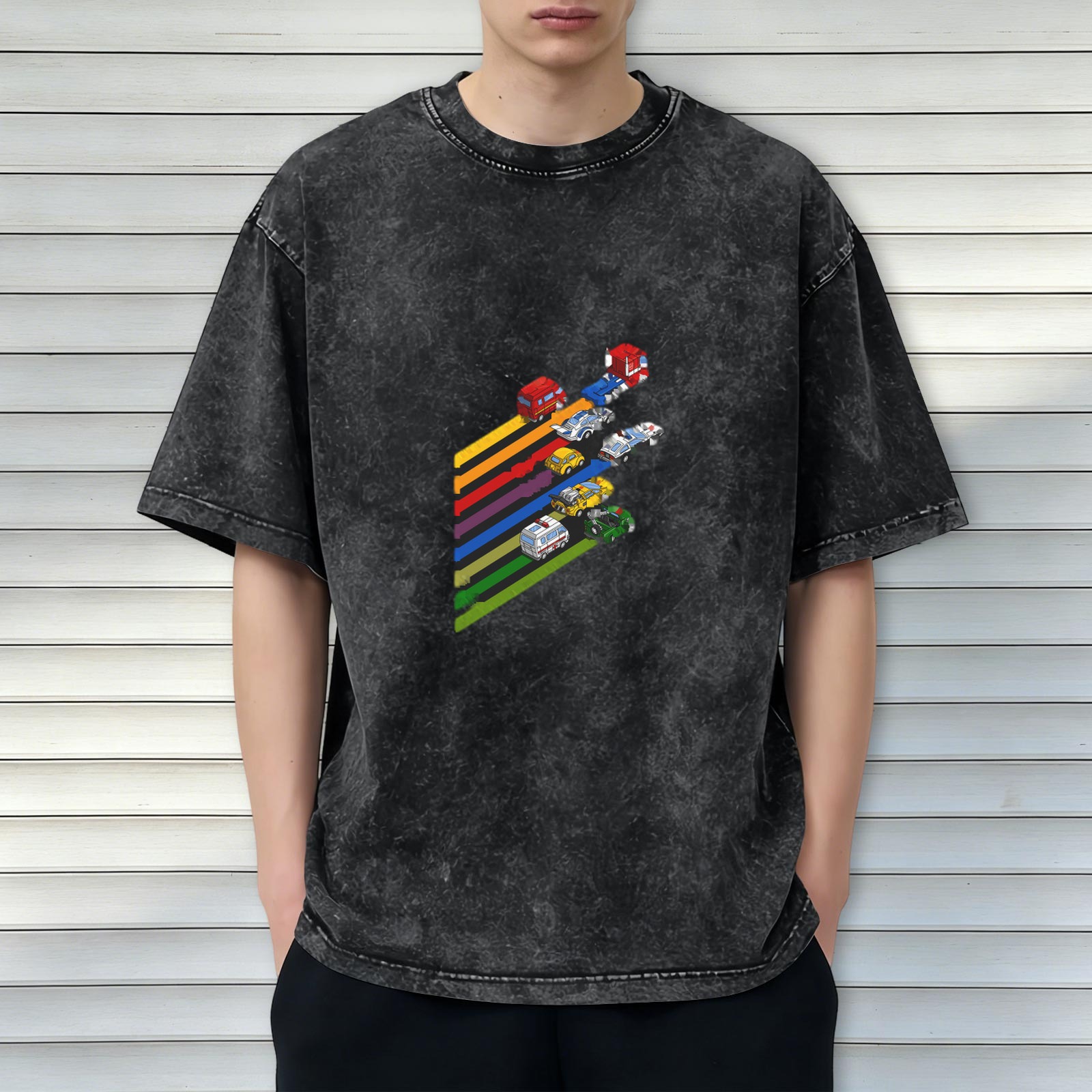 Washed black graphic t-shirt with retro vehicle rainbow stripes design