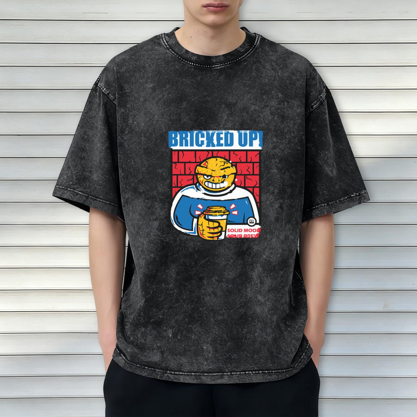 Oversized acid wash t-shirt with brick-themed cartoon graphic