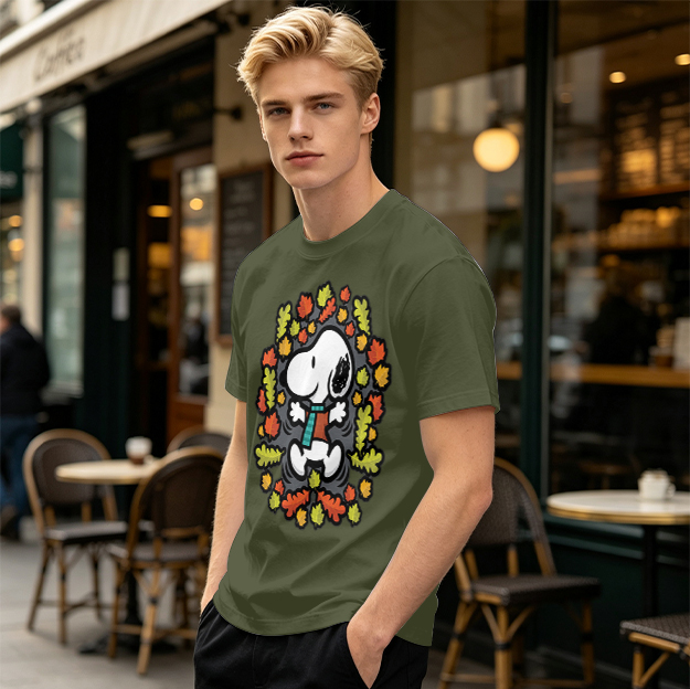 Olive green t-shirt with Snoopy playing in autumn leaves