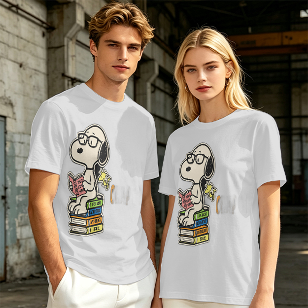 Olive T-shirt with Snoopy reading on stack of books