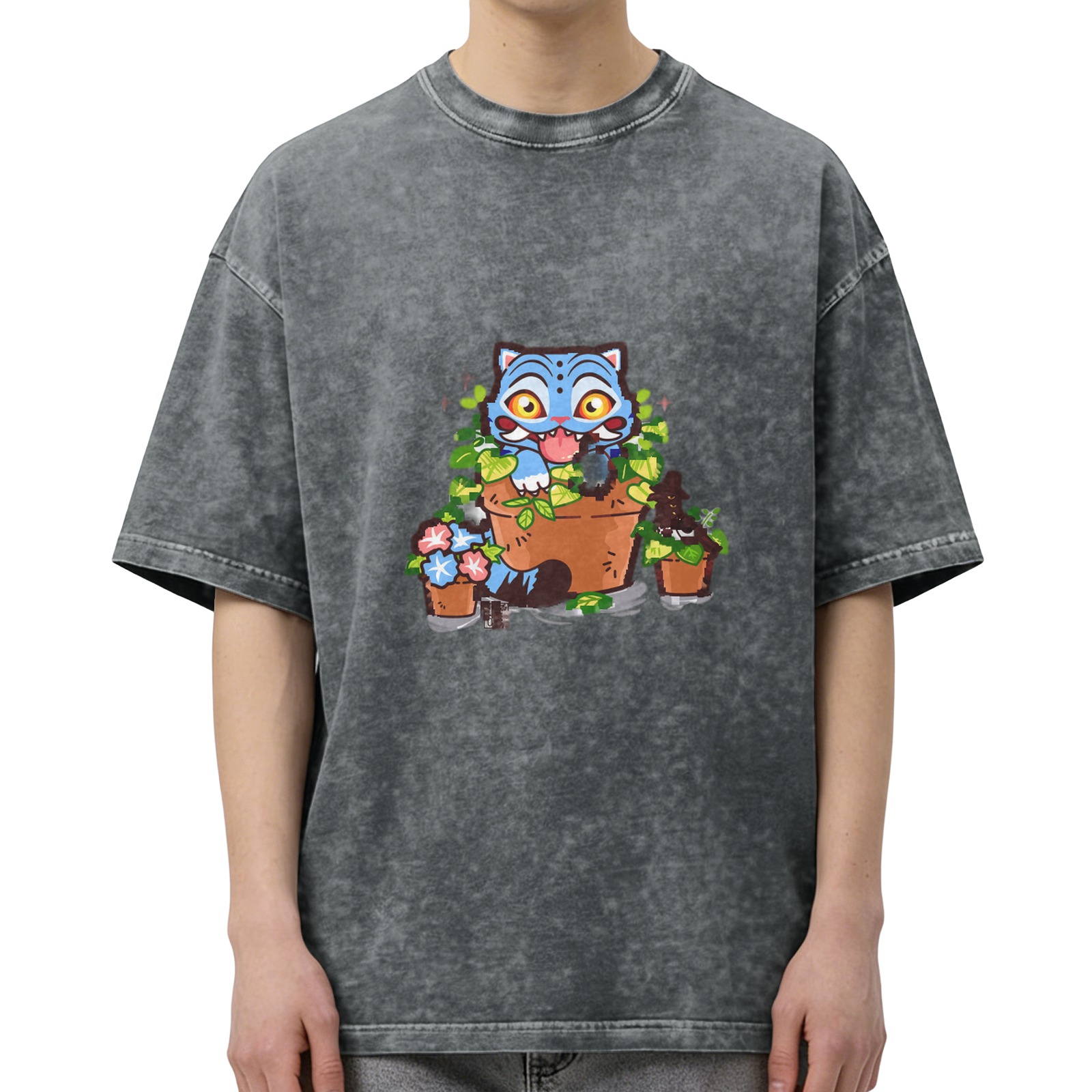 Washed black oversized t-shirt with playful blue cat in plant pots graphic