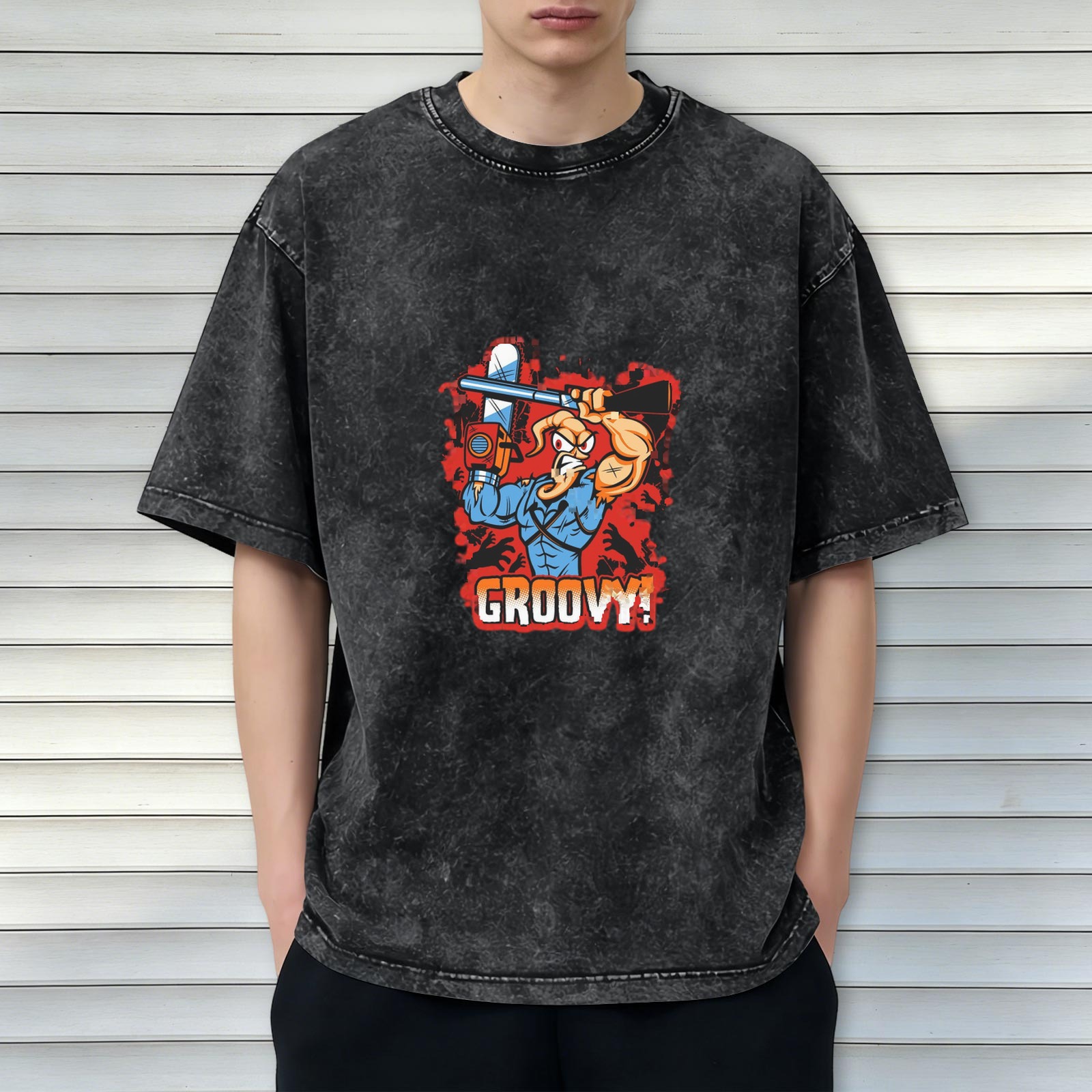 Vintage Washed Black T-Shirt with Cartoon Muscle Character Holding Chainsaw and 'GROOVY!' Graphic Print
