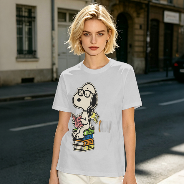 Olive T-shirt with Snoopy reading on stack of books
