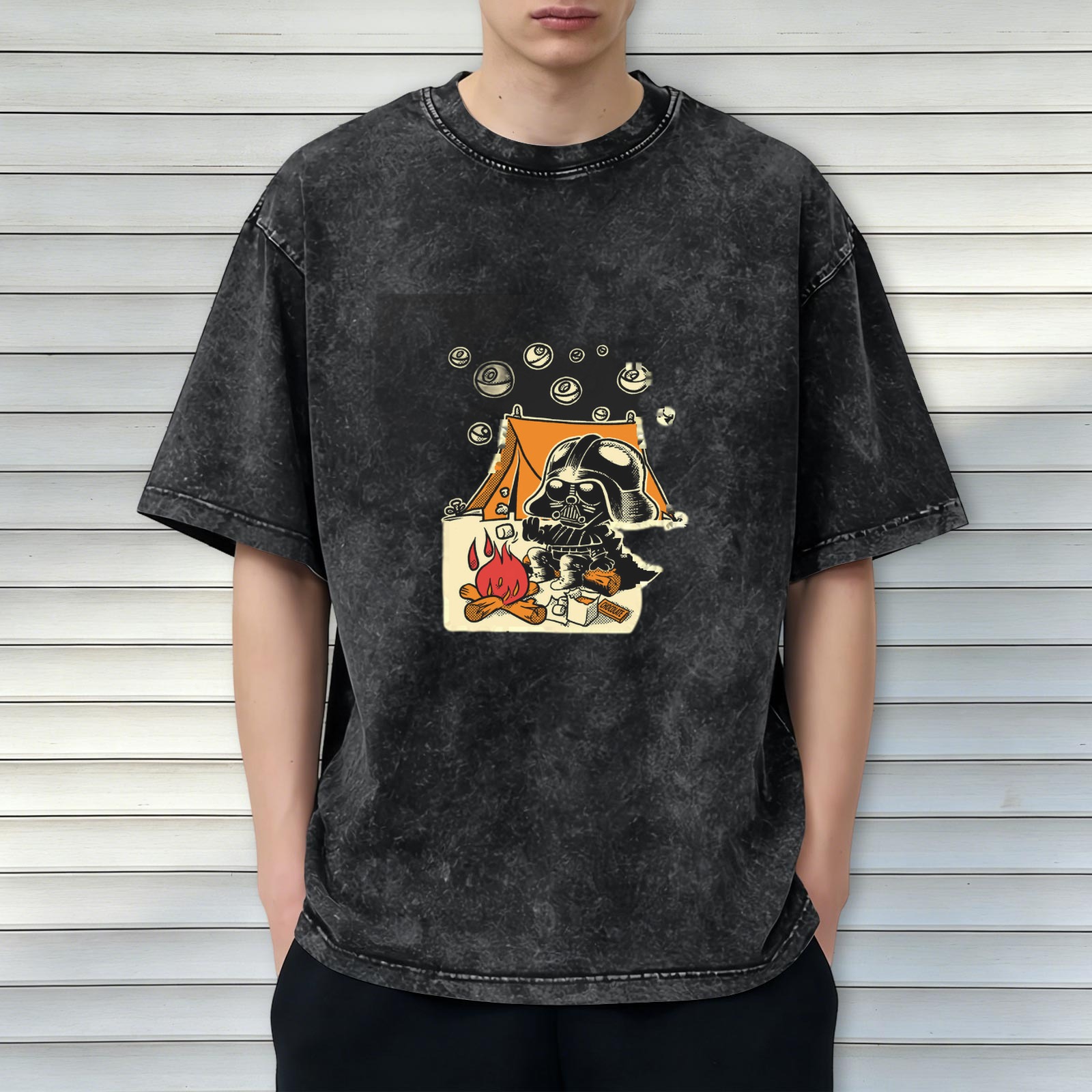 Oversized dark wash t-shirt with cartoon Darth Vader camping graphic