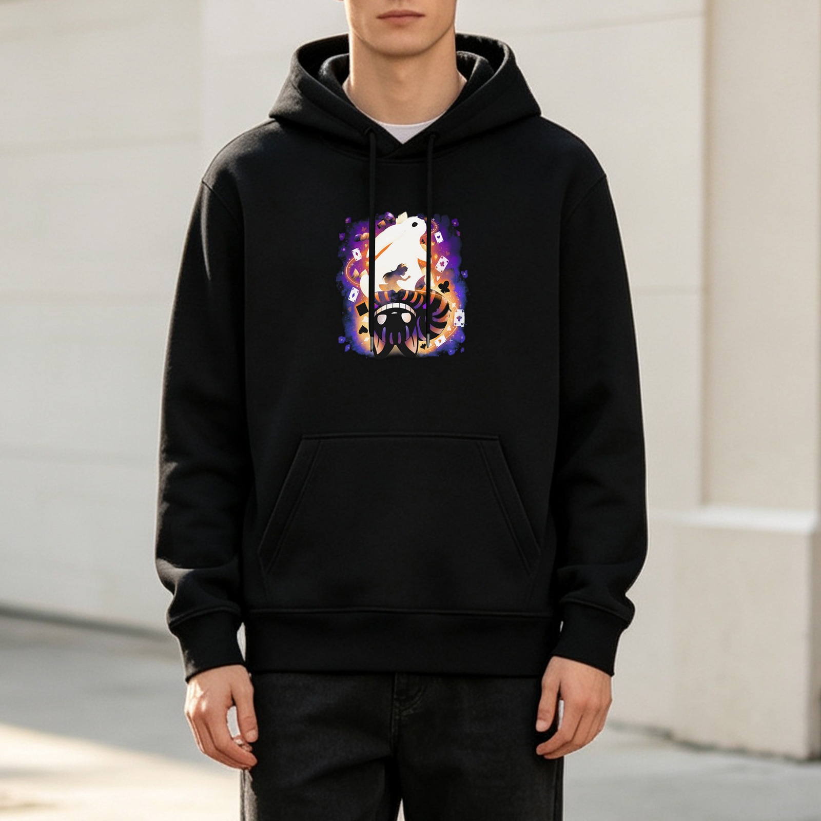 Black hoodie with whimsical glowing fantasy character graphic
