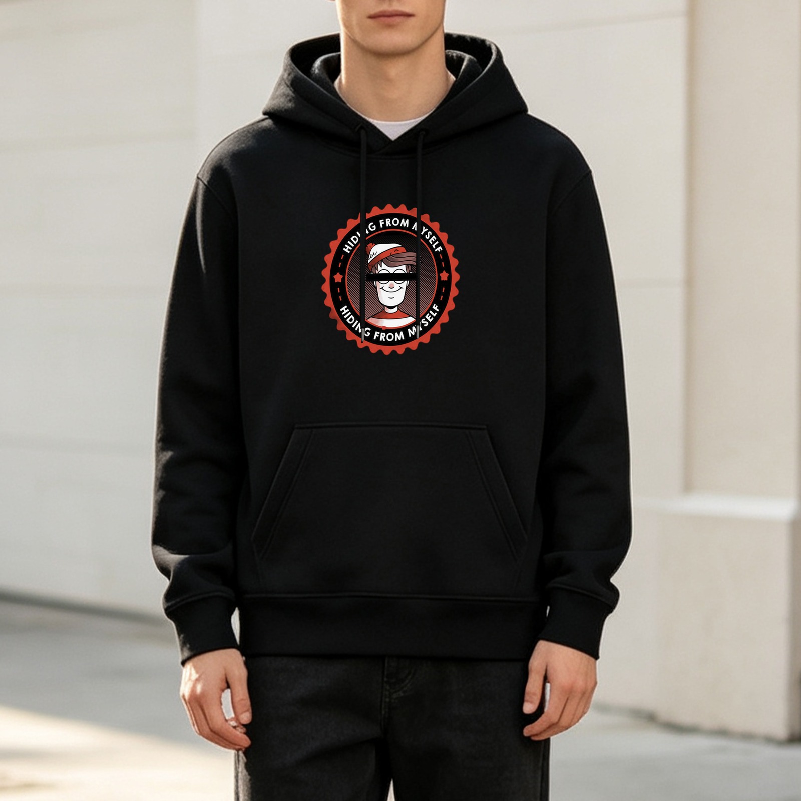 Black hoodie with 'Hiding From Myself' Waldo-style graphic