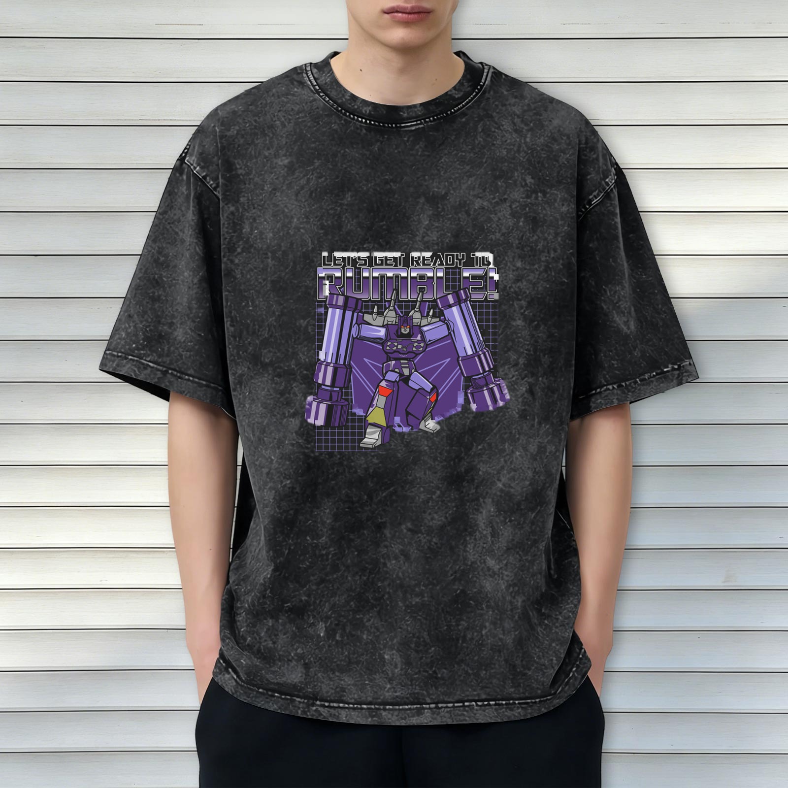 Oversized dark wash graphic t-shirt with Transformers Rumble design