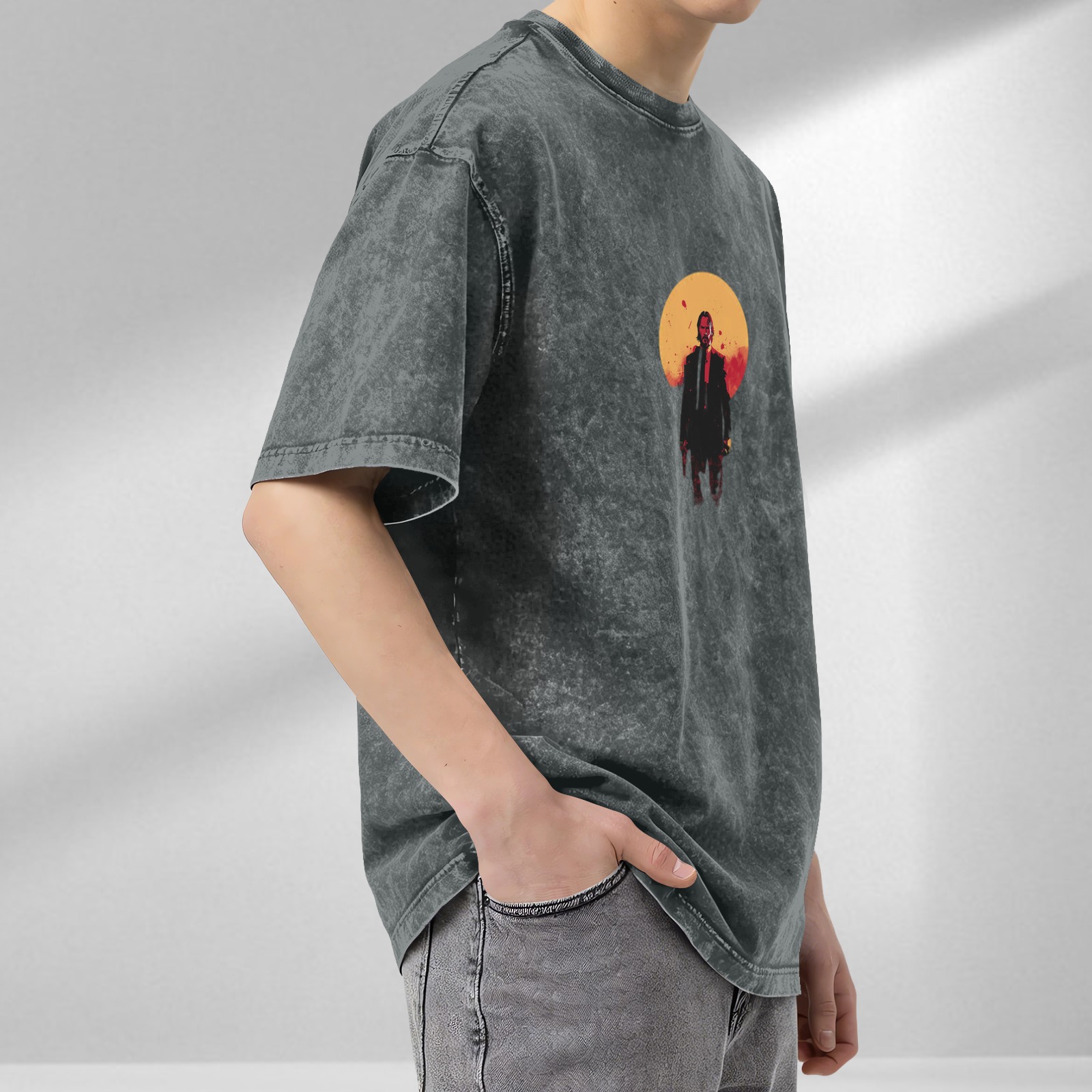 Oversized dark washed t-shirt with stylized action figure graphic