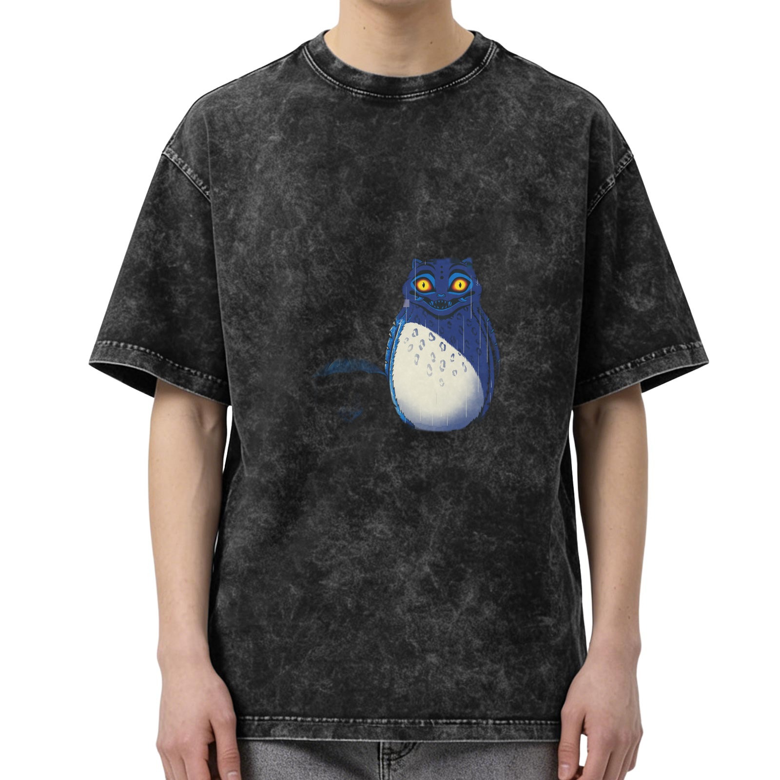 Oversized acid wash t-shirt with blue whimsical creature graphic