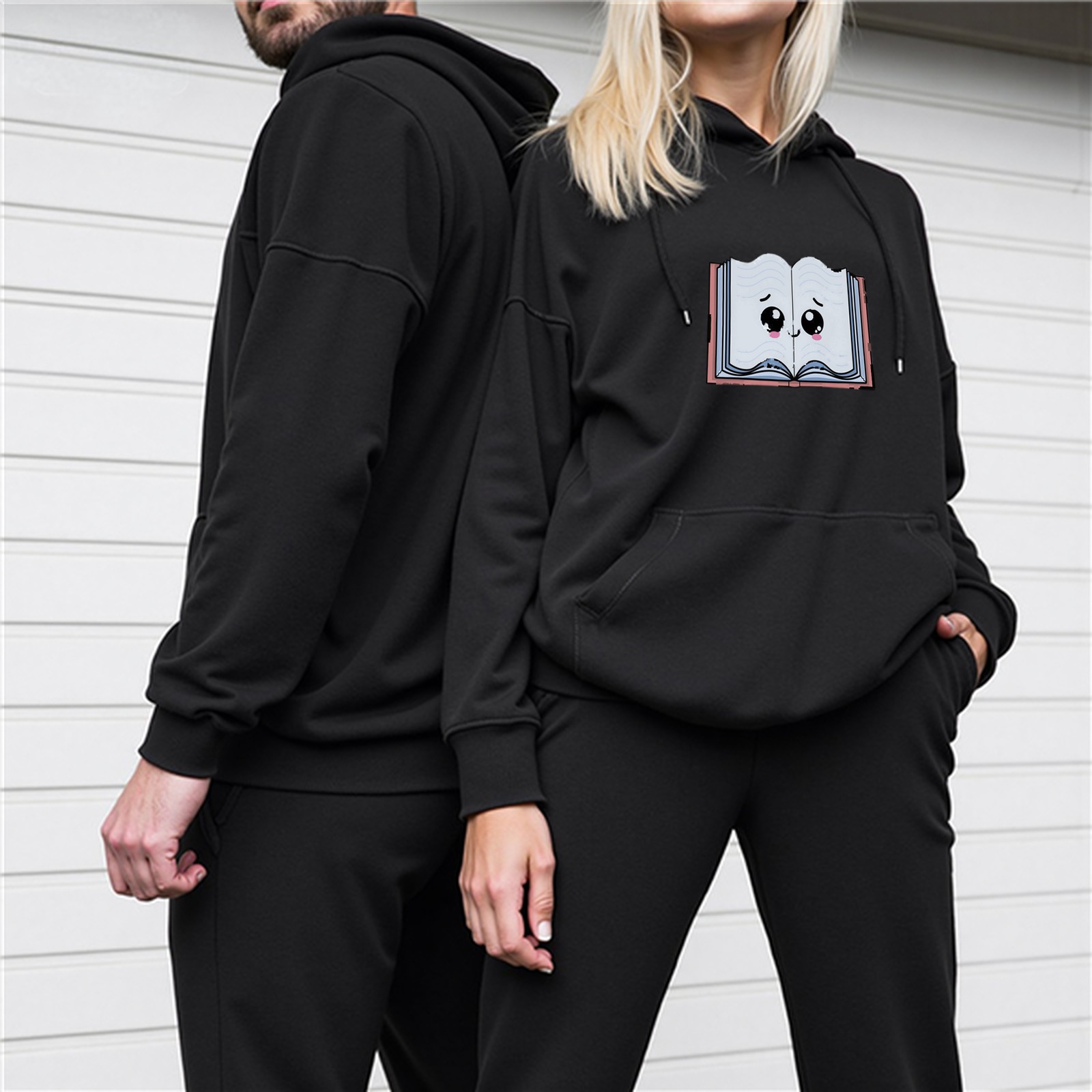 Black hoodie with cute cartoon open book graphic