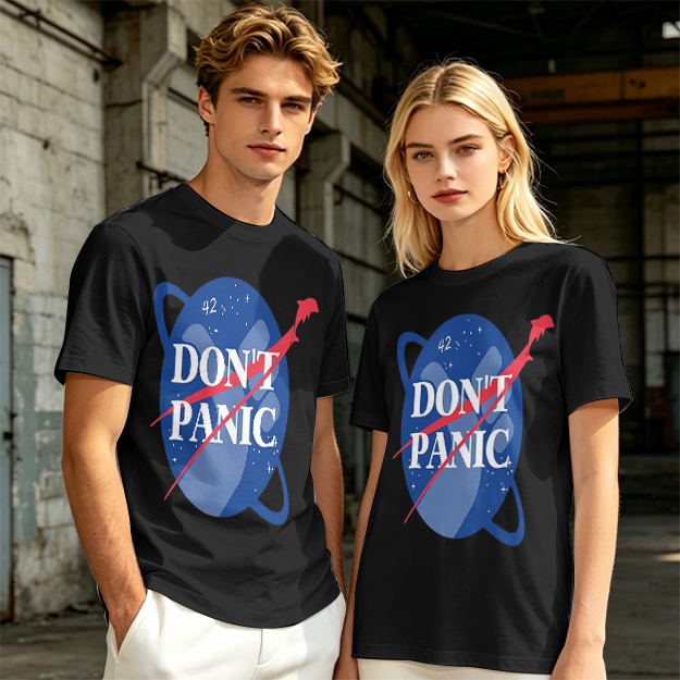 Olive green space-themed t-shirt with 'Don't Panic' print