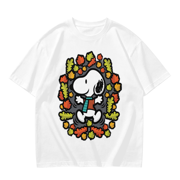 Olive green t-shirt with Snoopy playing in autumn leaves
