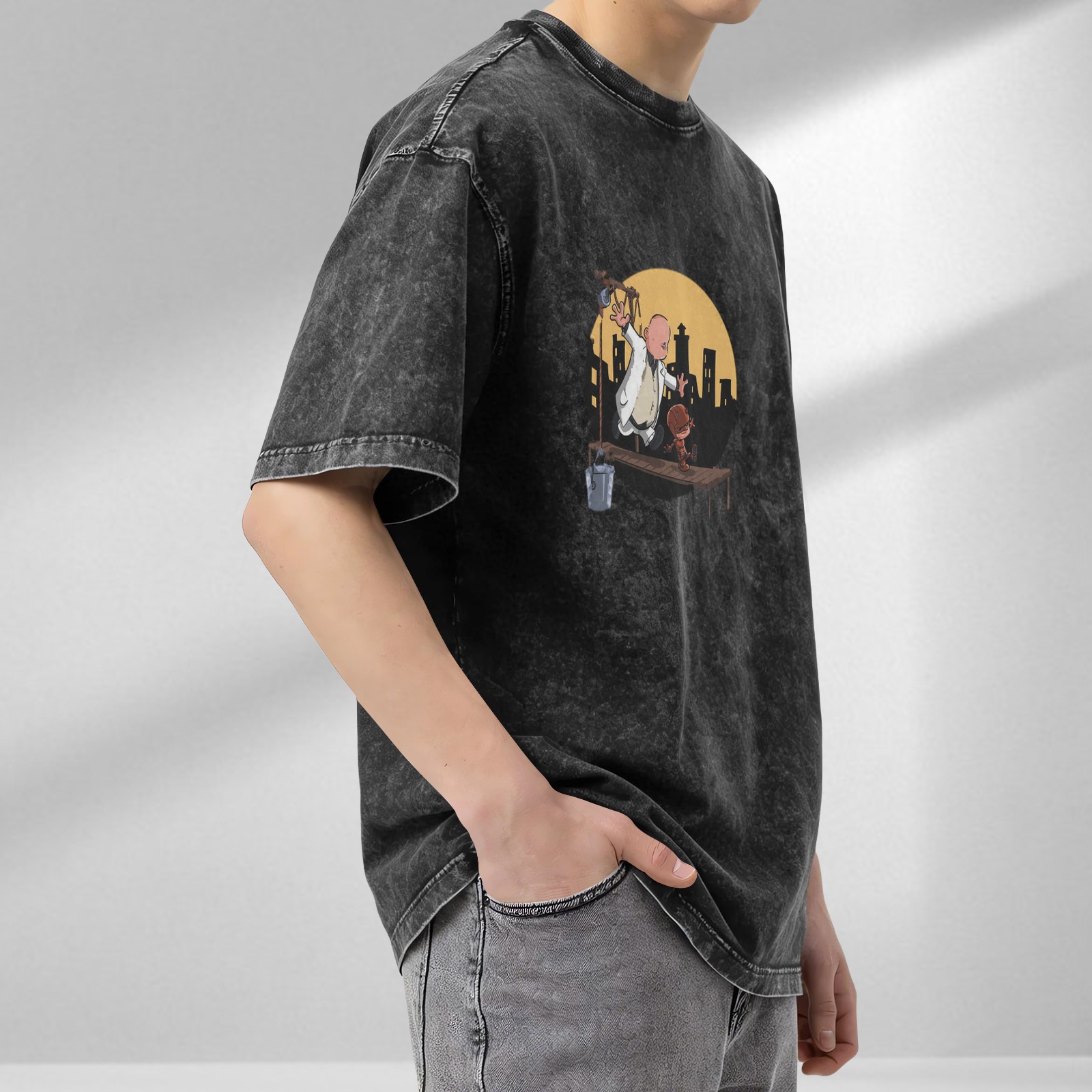 Washed black graphic t-shirt with cartoon characters on a scaffold city skyline