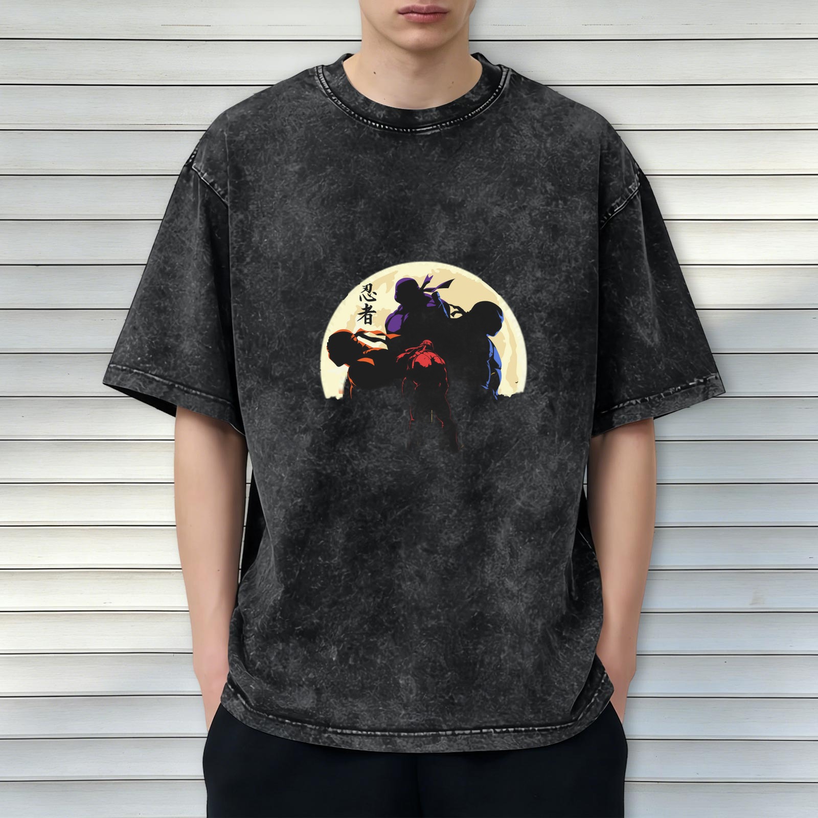 Washed black t-shirt with ninja silhouettes against a full moon