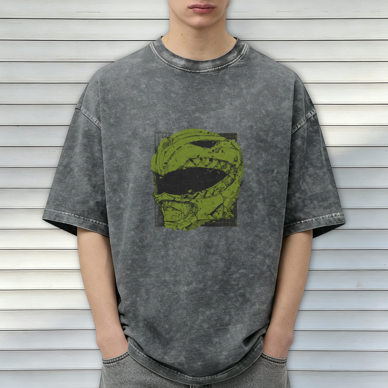 Washed black oversized t-shirt with green damaged helmet graphic