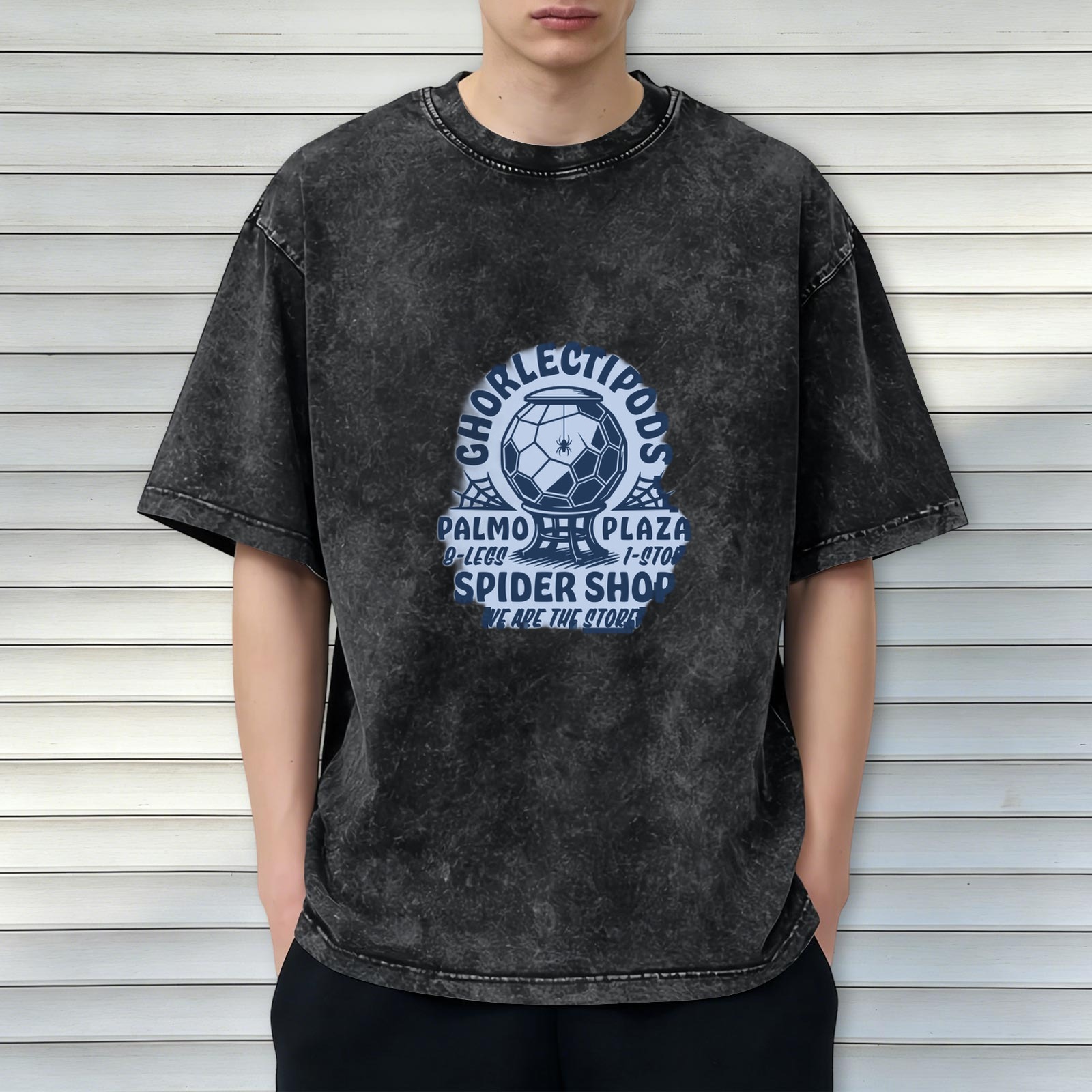 Washed black graphic tee with spider shop themed print