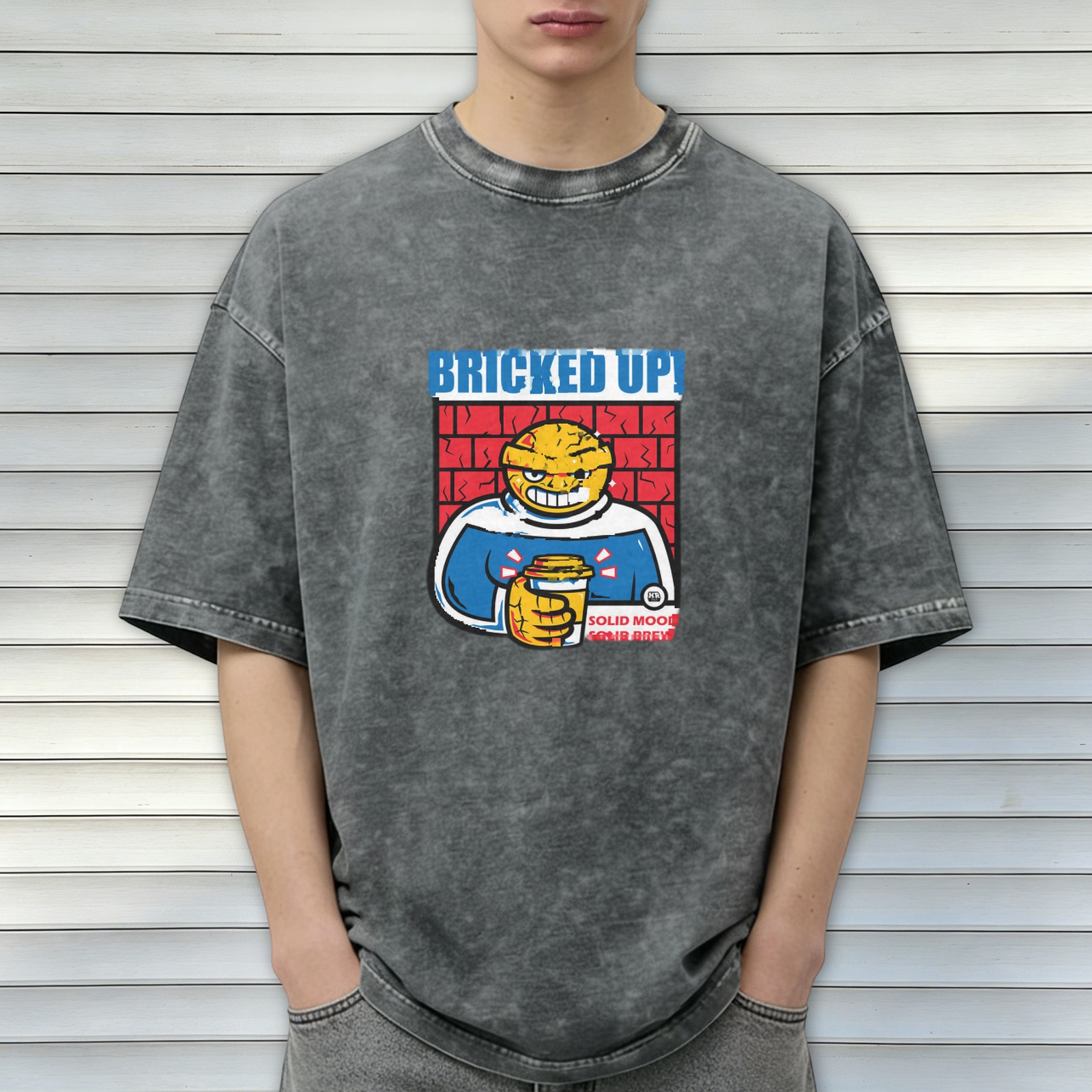 Oversized acid wash t-shirt with brick-themed cartoon graphic