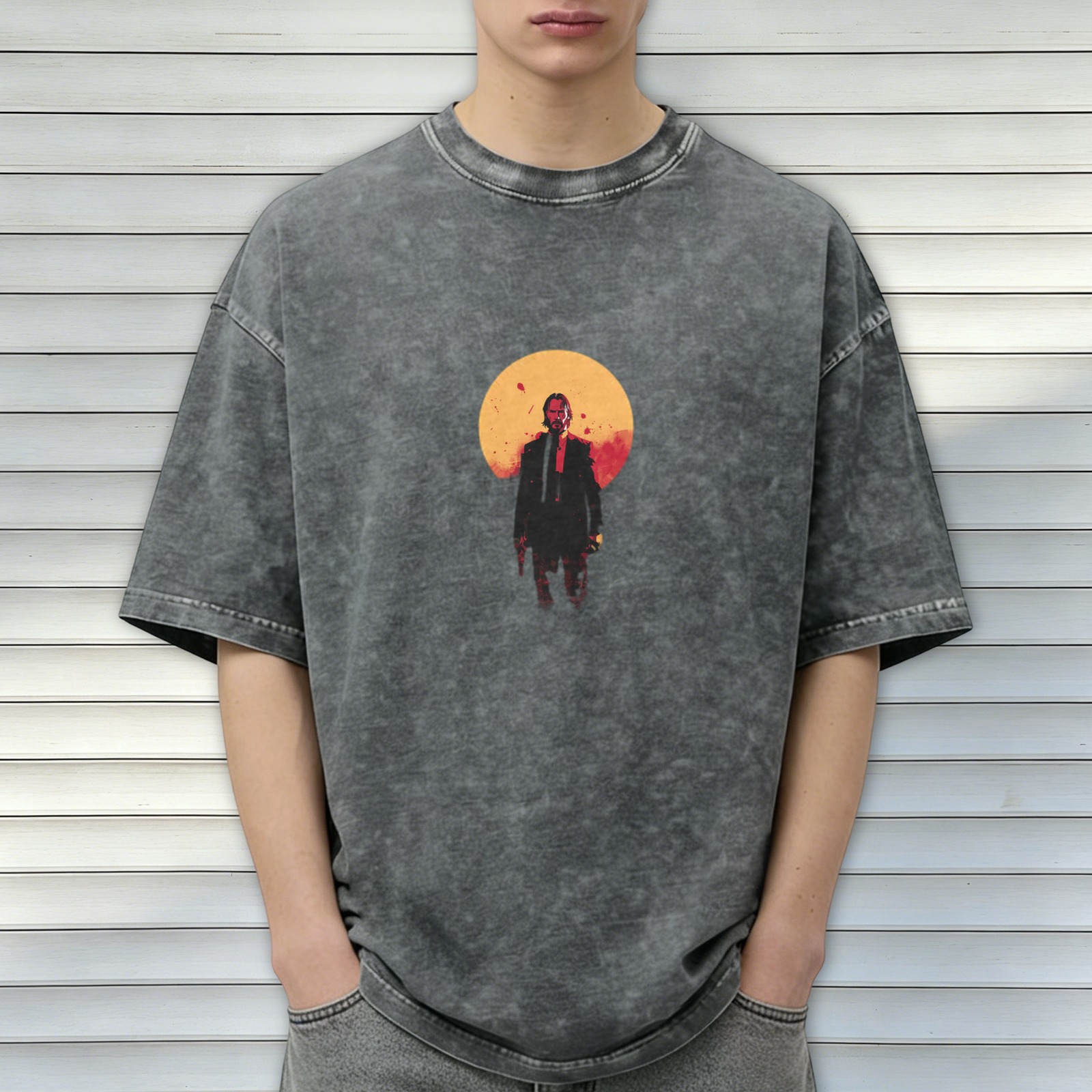 Oversized dark washed t-shirt with stylized action figure graphic