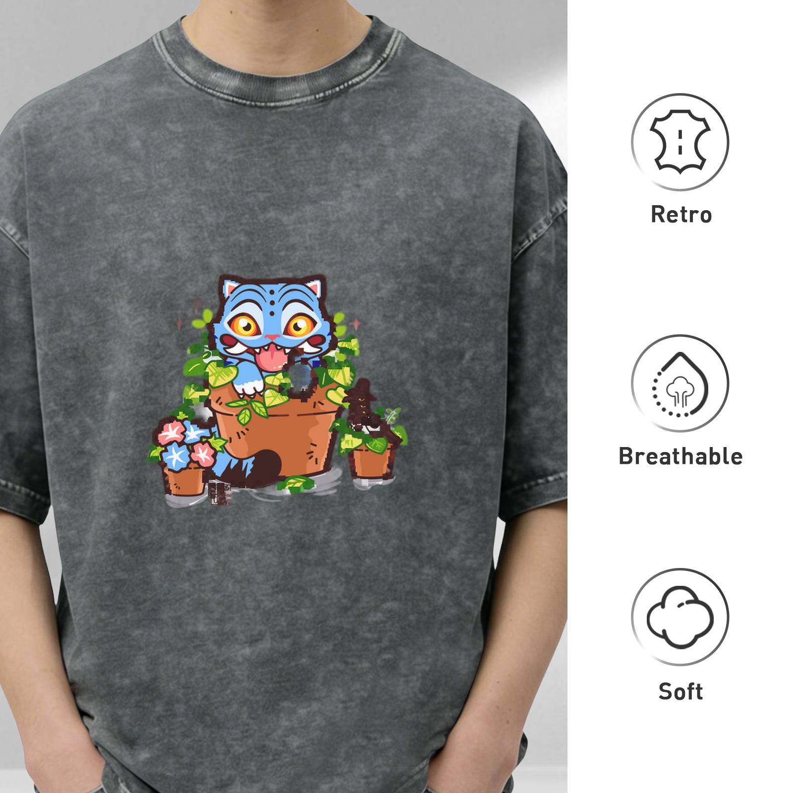 Washed black oversized t-shirt with playful blue cat in plant pots graphic