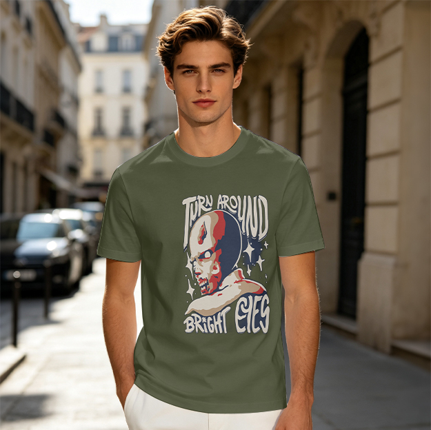 Olive graphic t-shirt with 'Turn Around Bright Eyes' alien print