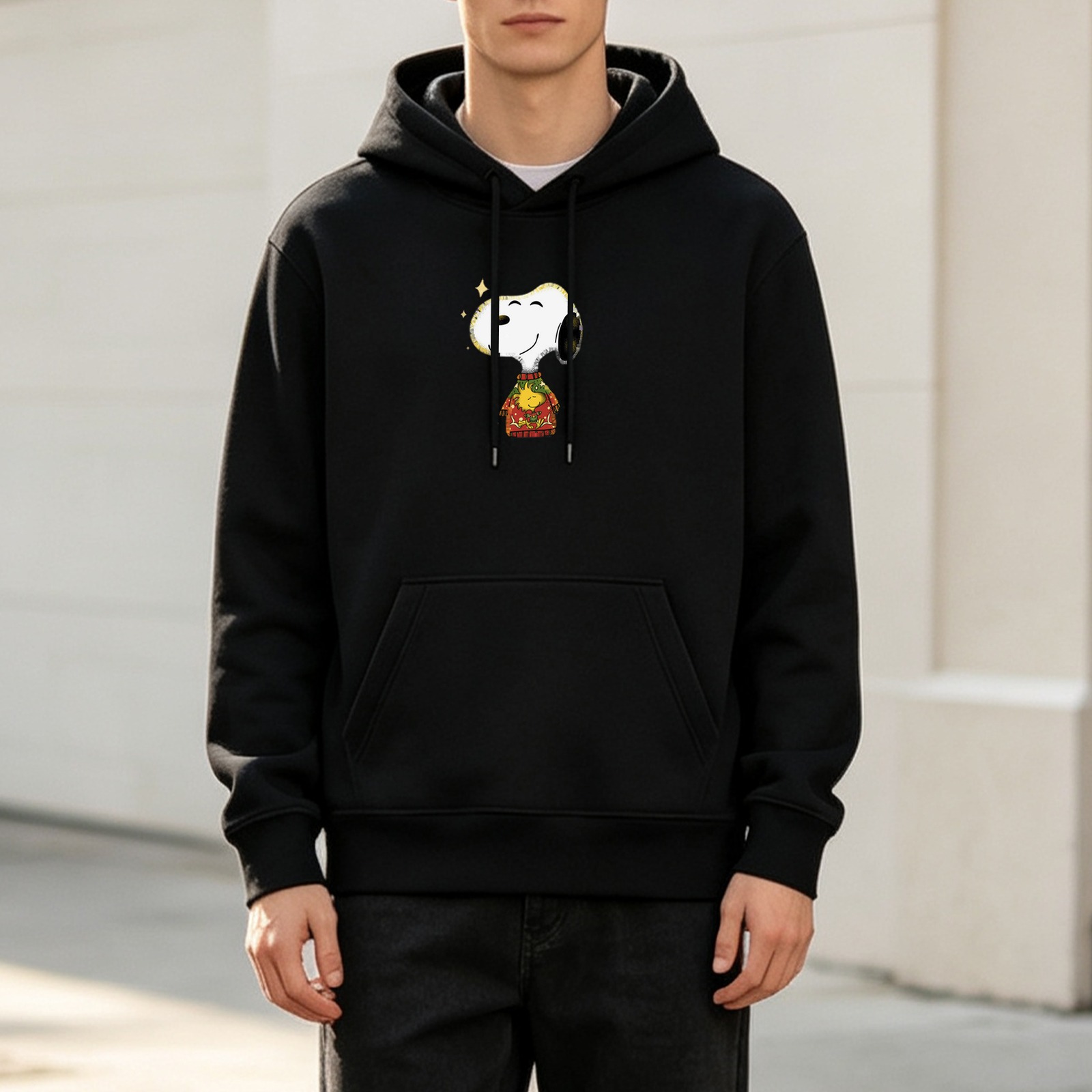 Black hoodie with Snoopy and Woodstock festive graphic