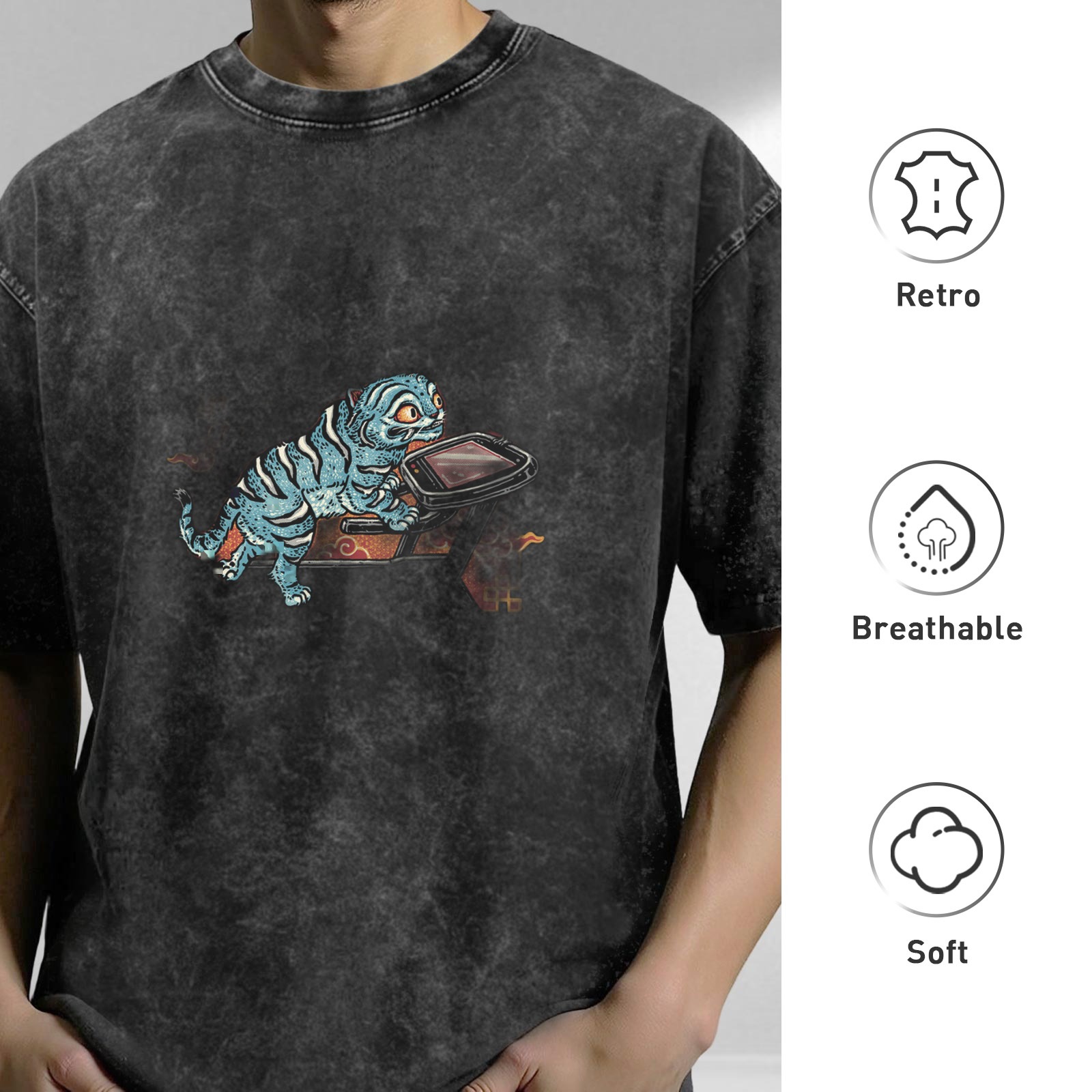 Oversized acid wash t-shirt with blue tiger riding retro device graphic