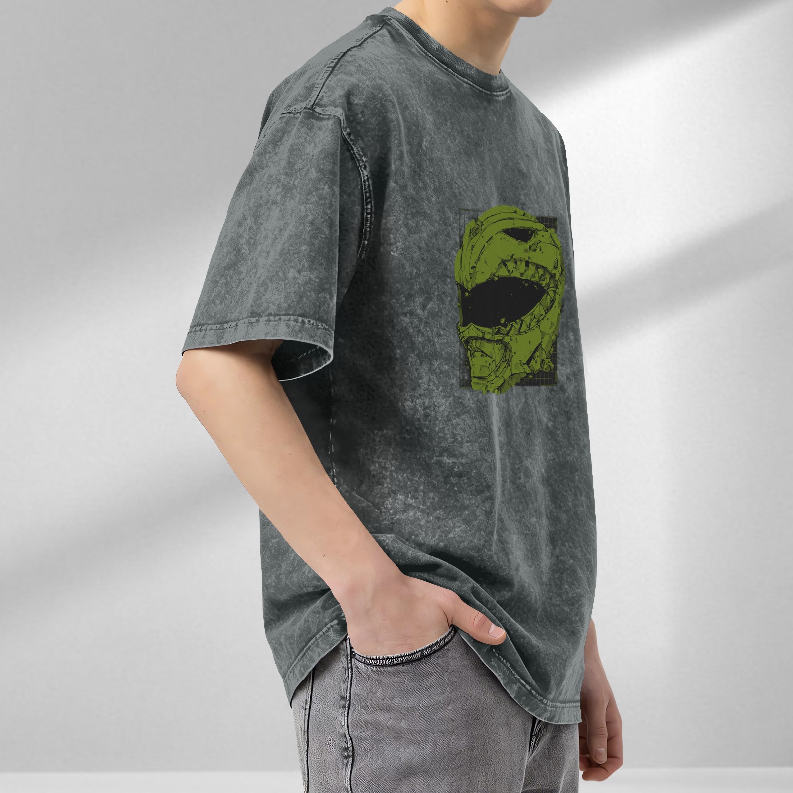 Washed black oversized t-shirt with green damaged helmet graphic