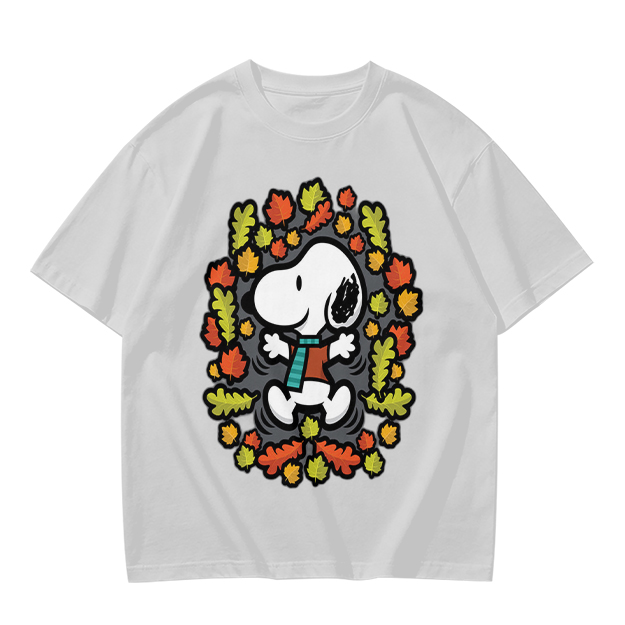 Olive green t-shirt with Snoopy playing in autumn leaves