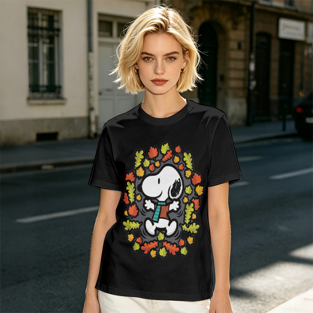 Olive green t-shirt with Snoopy playing in autumn leaves