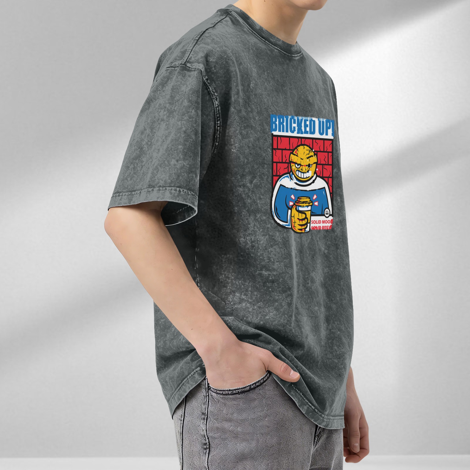 Oversized acid wash t-shirt with brick-themed cartoon graphic